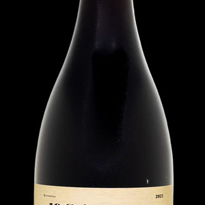 Wine bottle with label featuring a vintage image and text on a white background