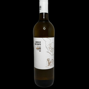 Wine bottle with a white label on a gray background